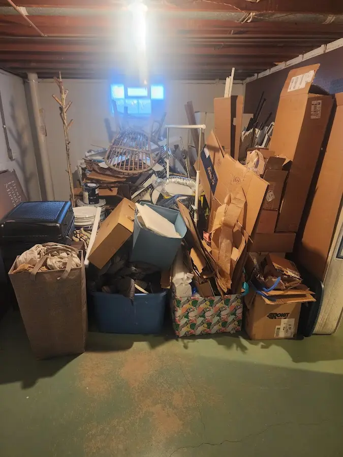 Roll-off dumpster container at job site for 4 Yard Dumpster Rental in West Slope